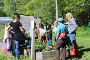 A group of students going on Wolfe's Neck Center on a field trip